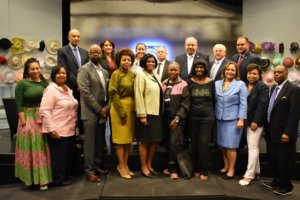 Partner Seymour James standing with DA Candidates